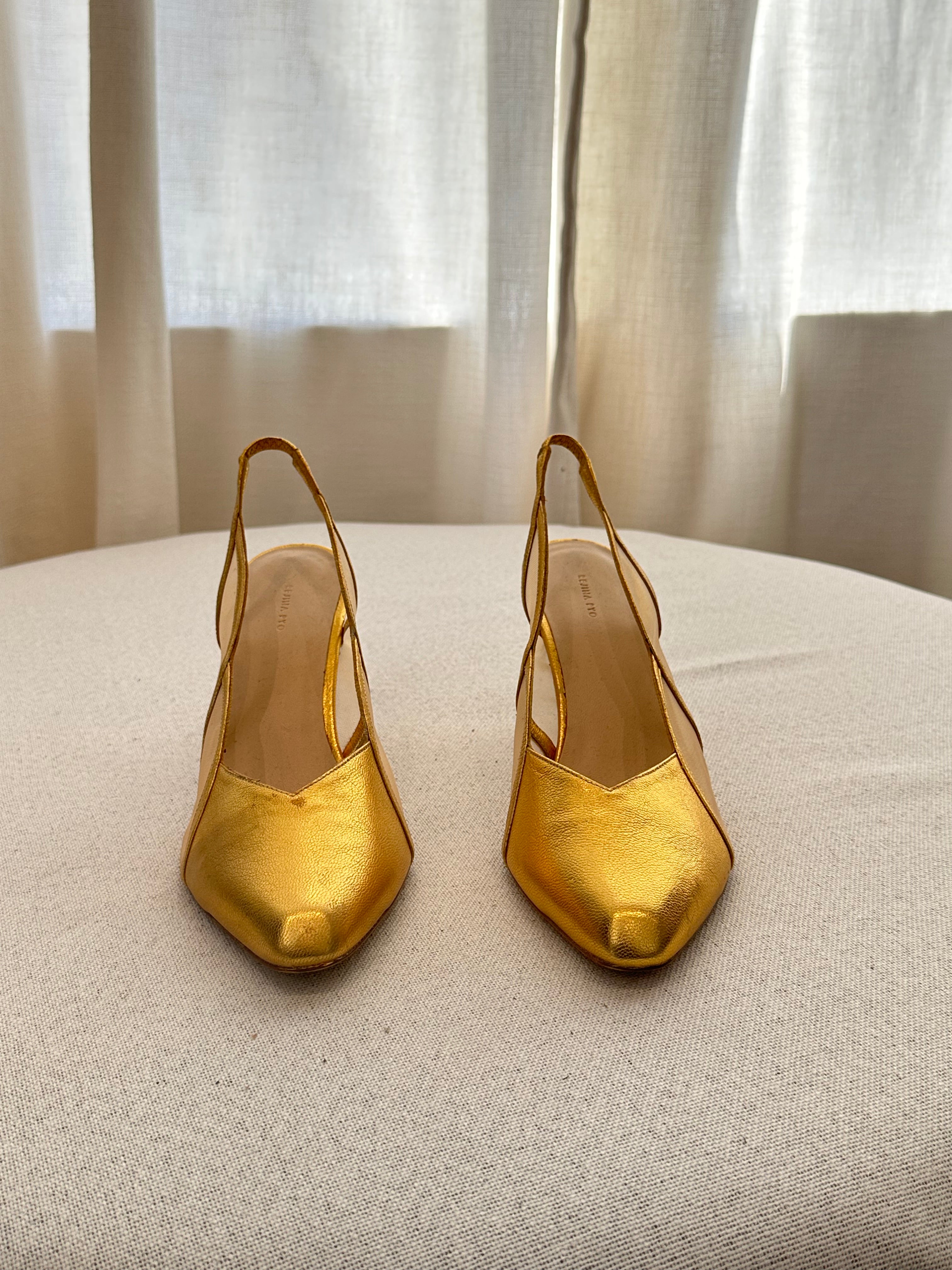 Rejina Pyo Gold Pumps